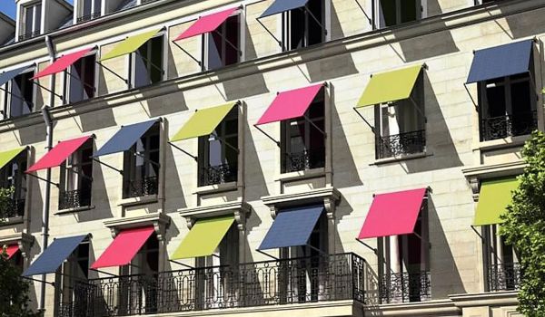 Installation de stores pare soleil exterieurs pour batiment à Paris